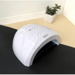 Гібридна лампа для манікюру SUN One UV/LED 48W з діодами подвійної дії для полімеризації та сушіння нігтів Гібридна лампа для манікюру SUN One UV/LED 48W з діодами подвійної дії для полімеризації та сушіння нігтів